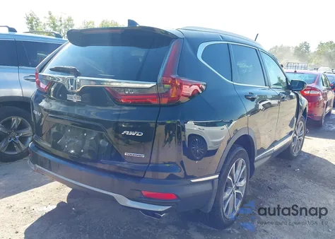 2021 Honda Cr-V Awd Touring z USA, uszkodzony, nr VIN 5J6RW2H94ML004555